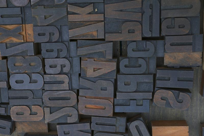 Old wooden vintage typography printing blocks